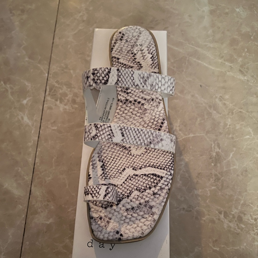 Black and white animal print slippers